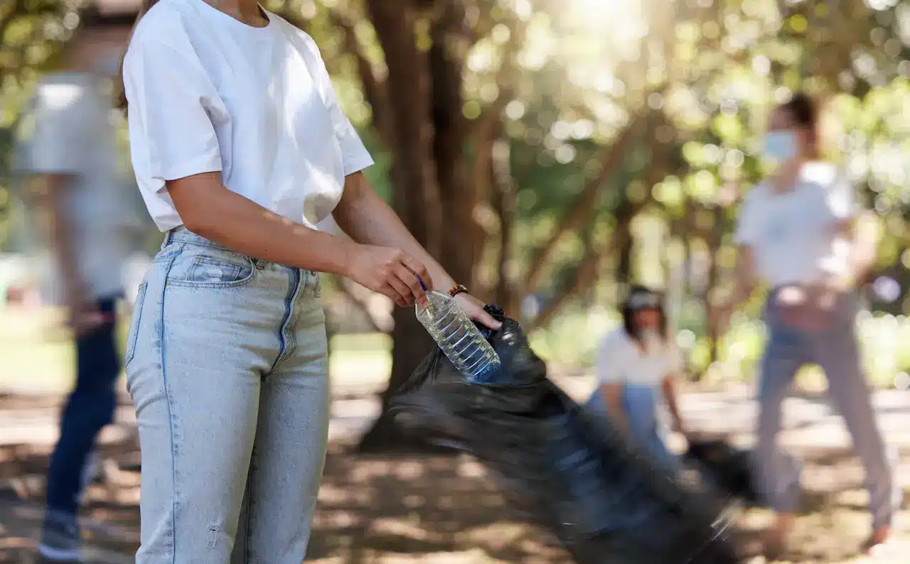 A Girl Holding a Plastic Bottle