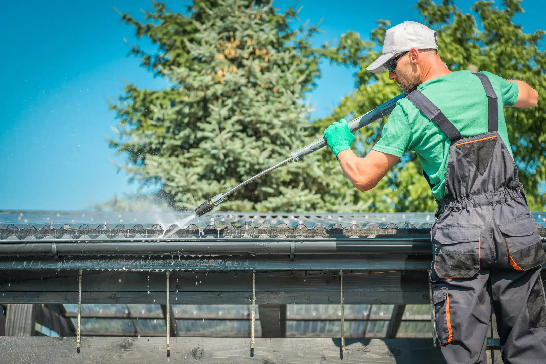 Man Cleaning the Roof 